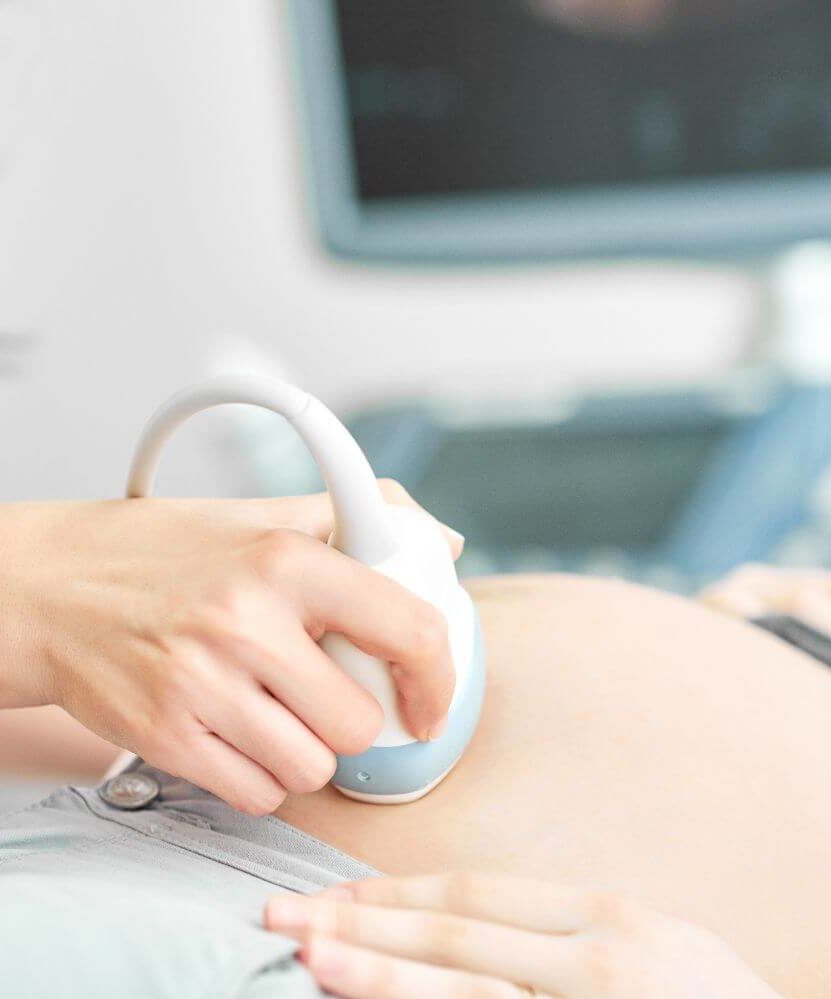 Woman receiving an ultrasound.