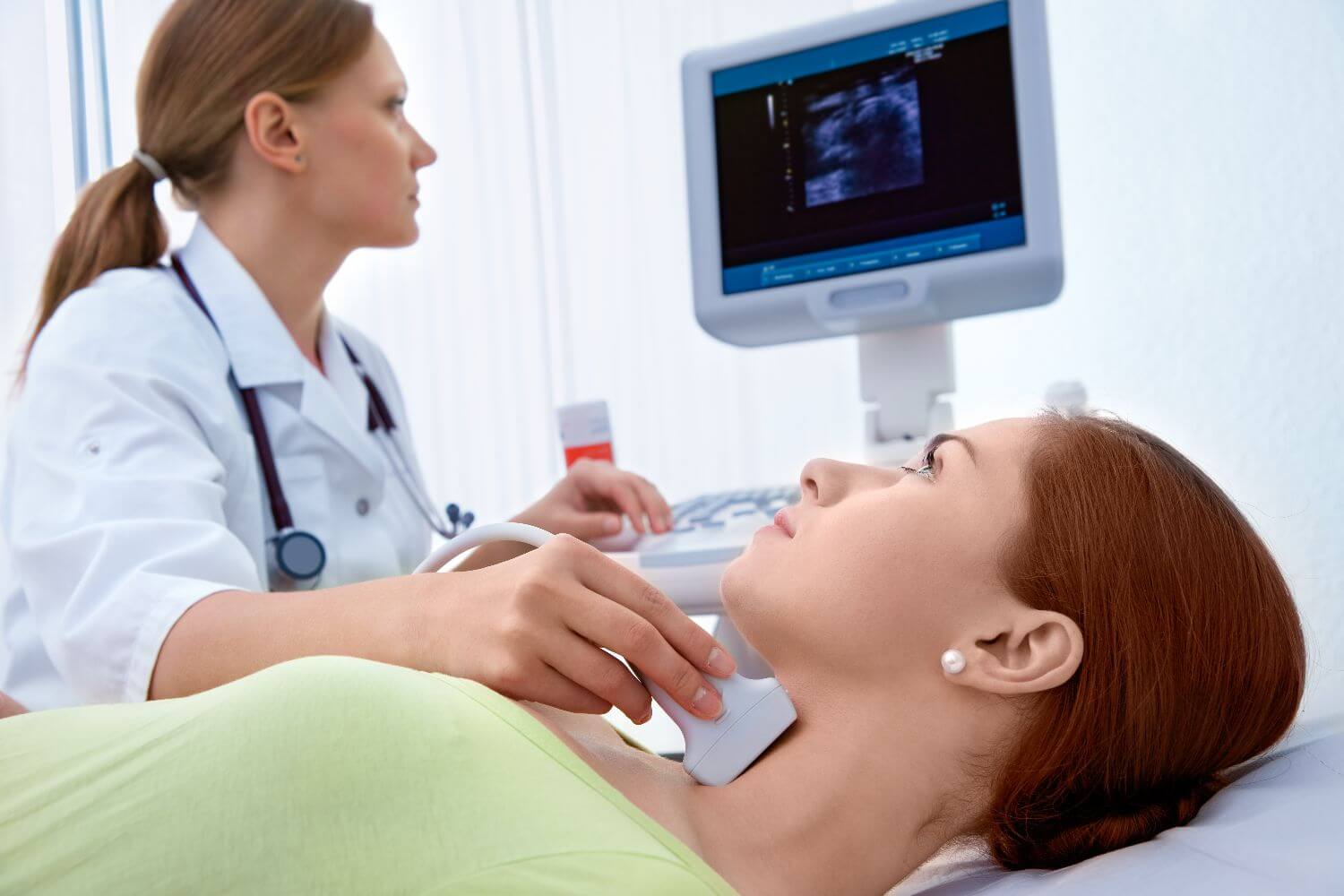 woman getting medical imaging done on her throat